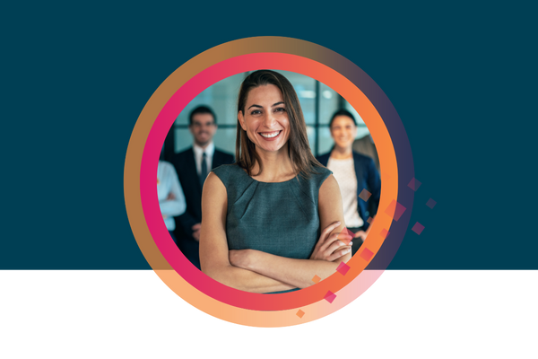 Confident automotive marketing expert standing with team, representing human insight and strategic decision-making.