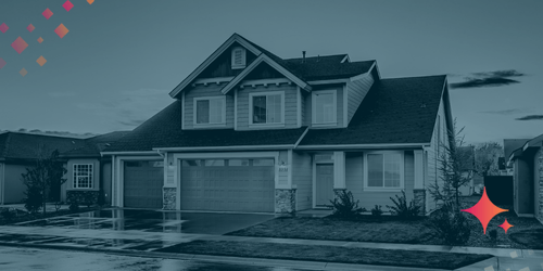 Front view of a modern suburban home with a three-car garage, landscaped yard, and wet driveway at dusk.